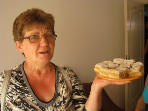 Medicare nurse Gizzi with some of her famous cakes