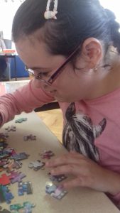 Enjoying a jigsaw in the Day centre